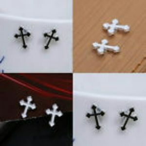 Small black or white magnetic cross ear studs